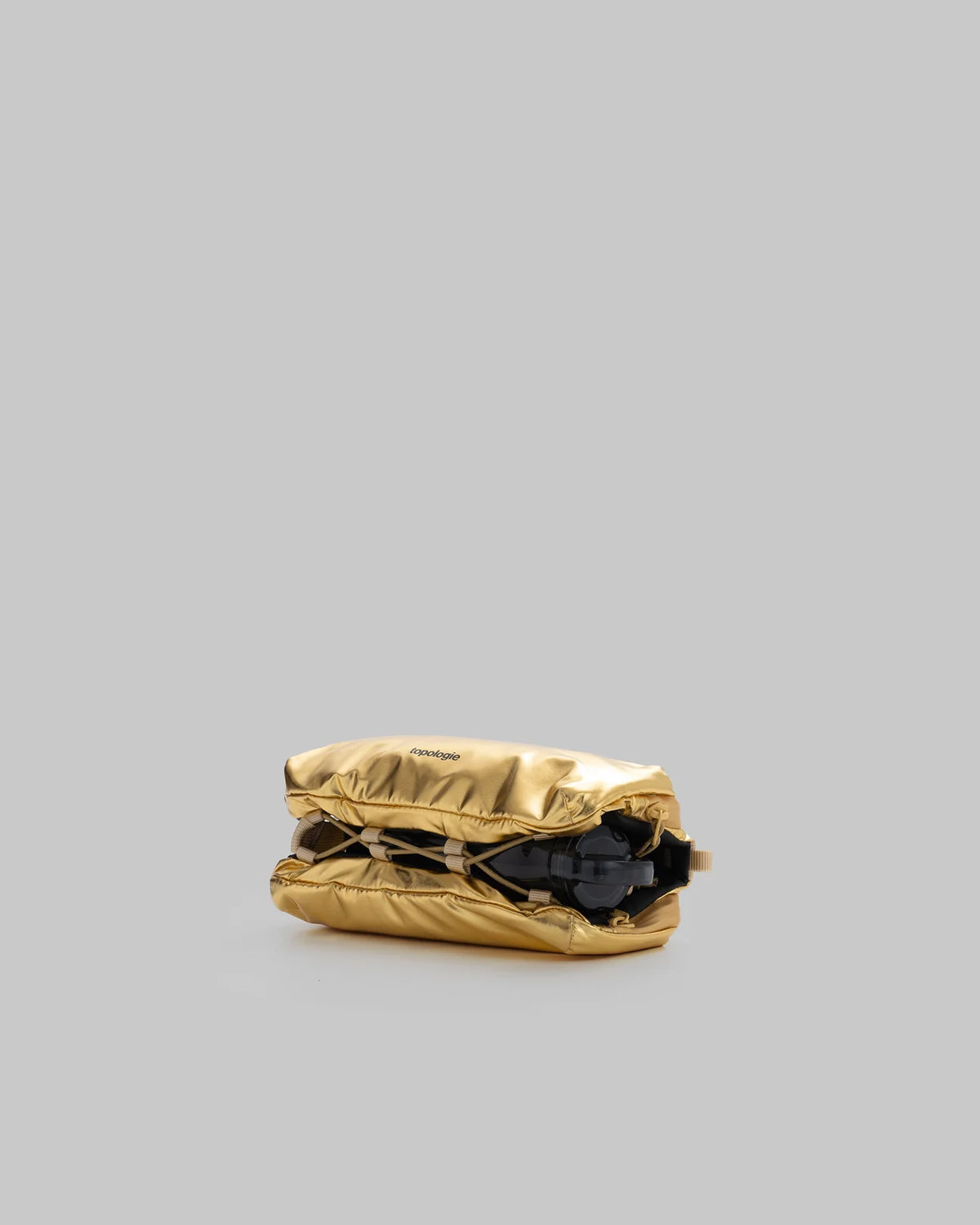 TOPOLOGIE Bottle Sacoche Medium Gold Metallic